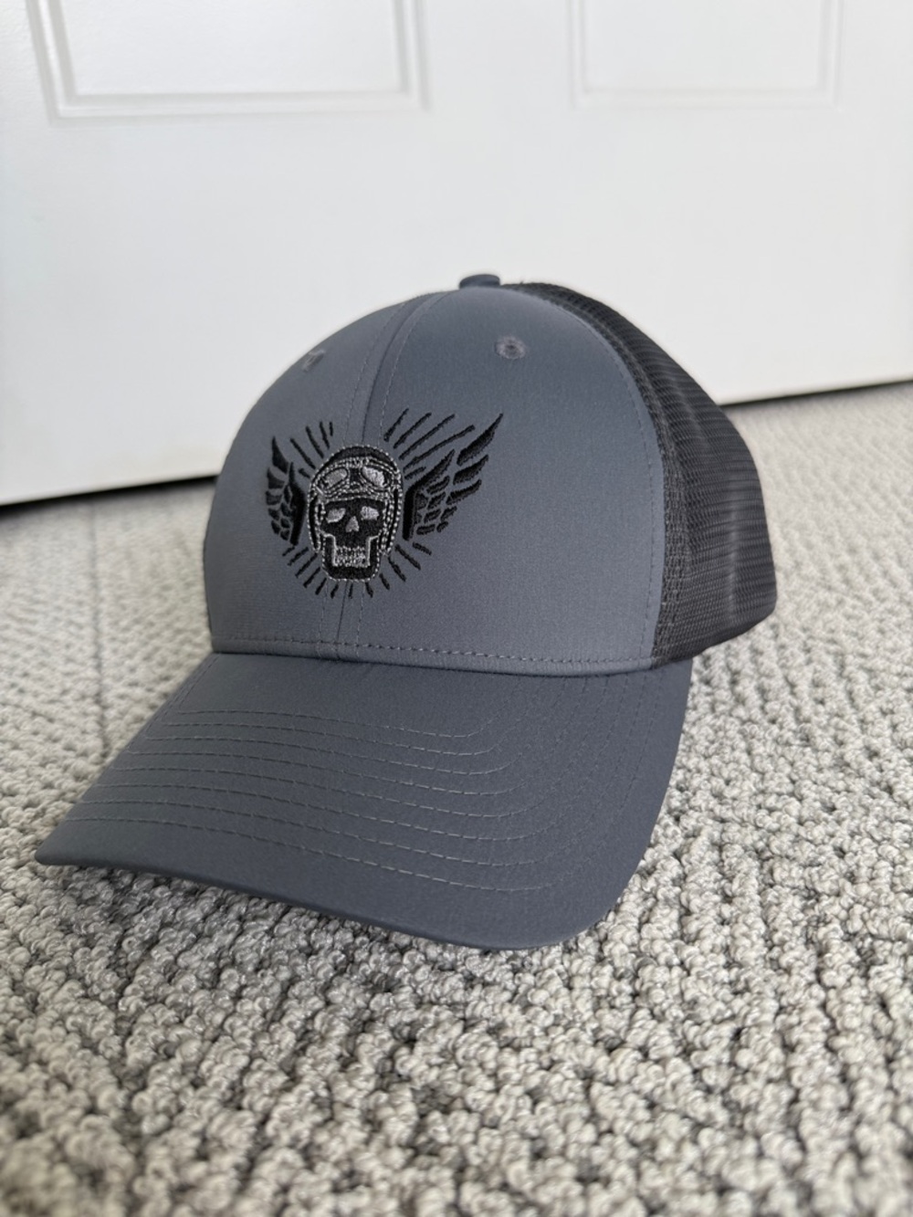 Gray Trucker Hat with Winged Skull Embroidery